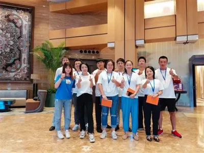 Group Photo Of The Company Team And Customers Group Photo Of The Company Team And Customers